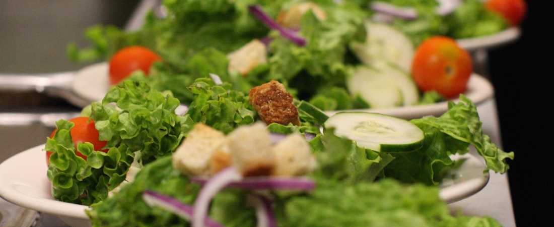 salads lined up in the kitchen